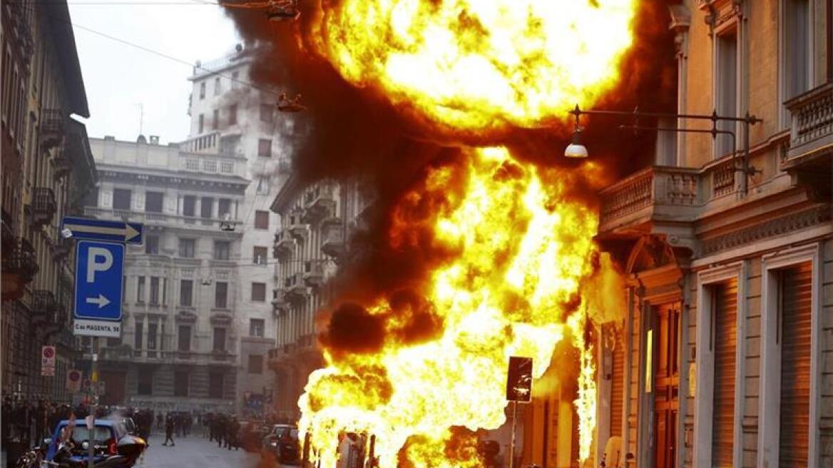 Το Μιλάνο στις φλόγες: Διαδηλωτές έκαψαν τράπεζες, καταστήματα και αυτοκίνητα