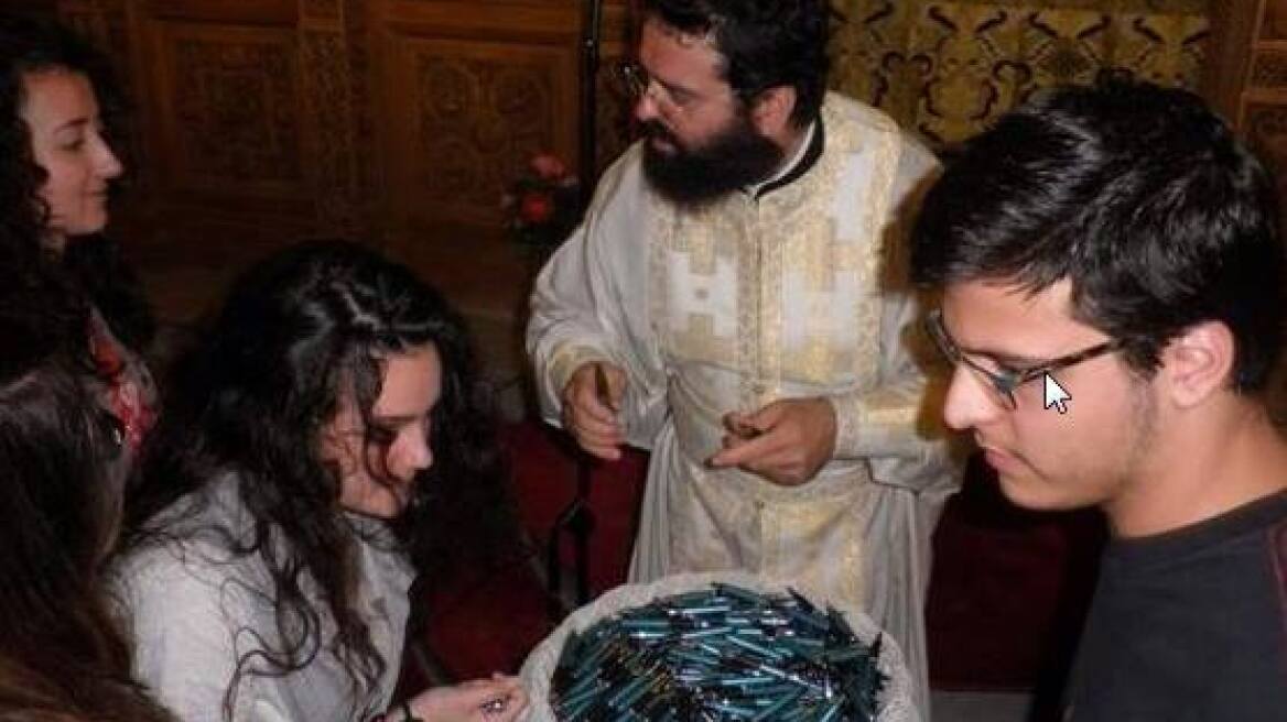 Church hands out blessed pens for guaranteed Panhellenic exam success!