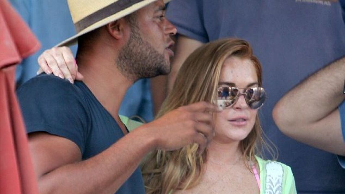 Bikini-clad Lindsay Lohan on Mykonos, again (pics + vid)