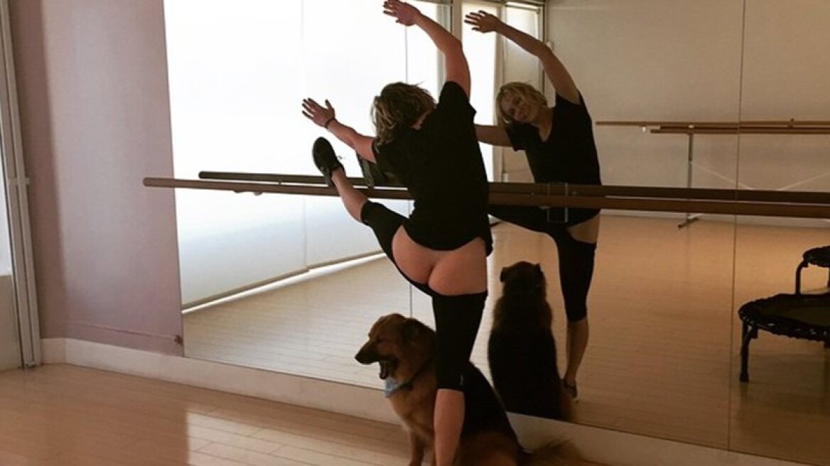 Chelsea Handler bare all… except for small area covered by an apple (see pic)