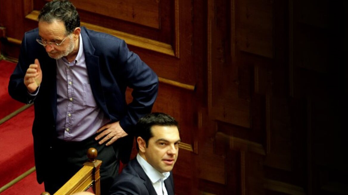 Tsipras aide-speechwriter bolts, while former comrades step up attacks