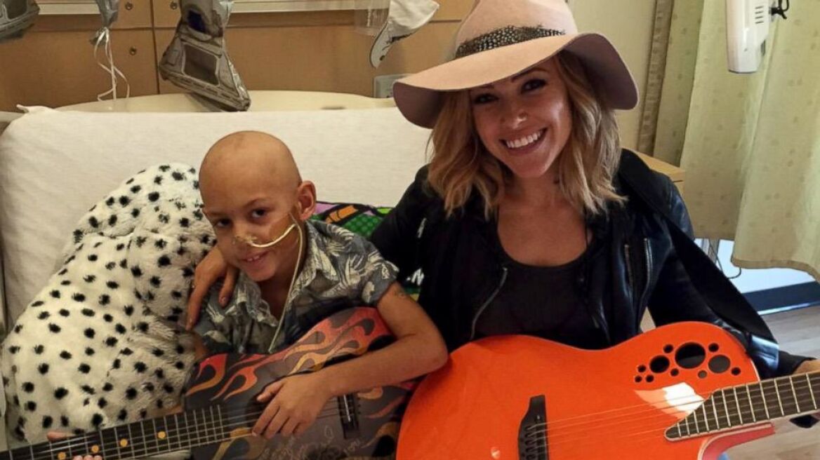 Cancer child sings with his idol (warning: video will make you cry) 