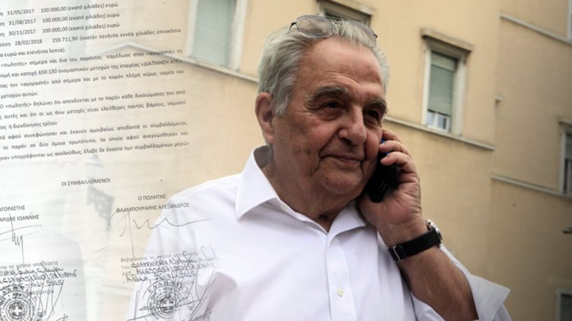 Flambouraris covers up contract of shame... with liquid paper! 