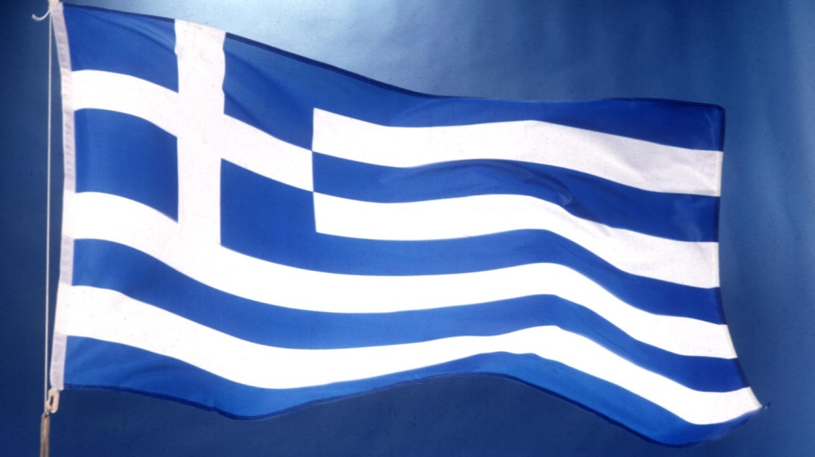 A Greek flag burned at Agioi Saranta