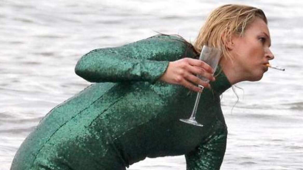 Kate Moss emerges from the Thames