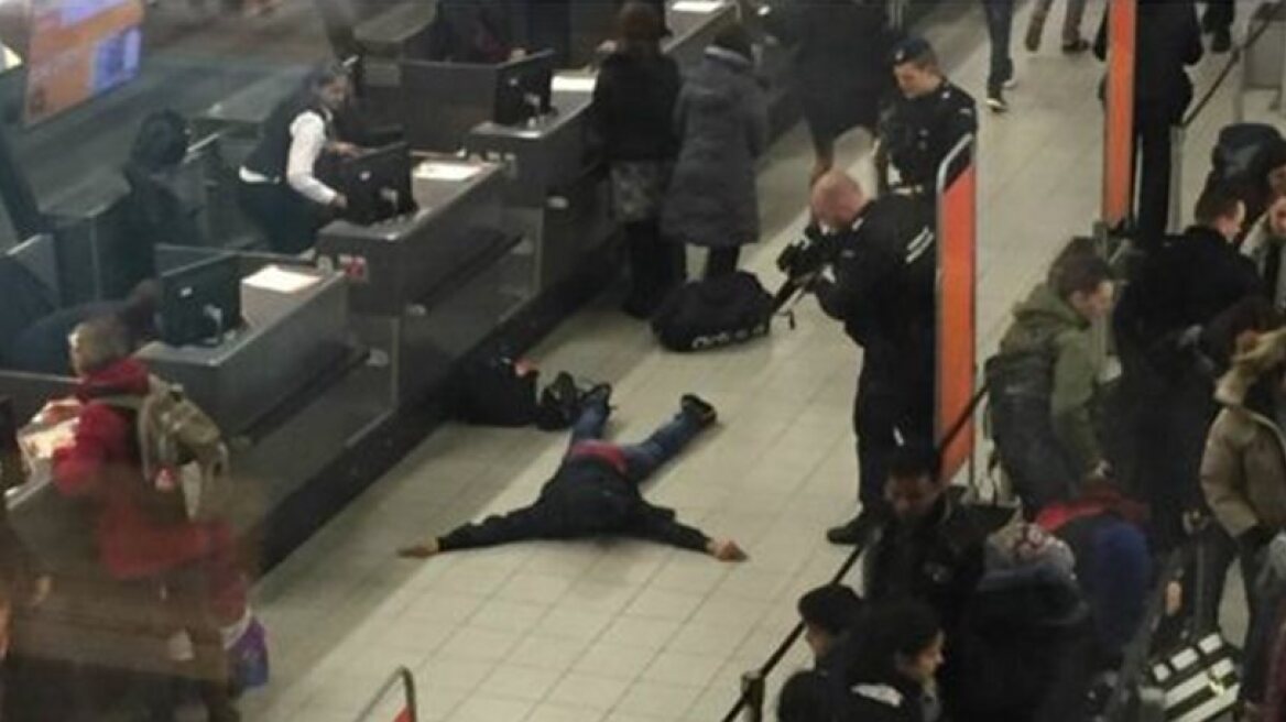 Amsterdam airport evacuated over man shouting bomb threat