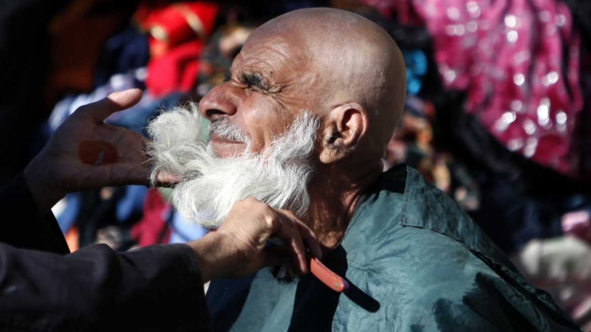 Where is the country where it is illegal to have a beard? 