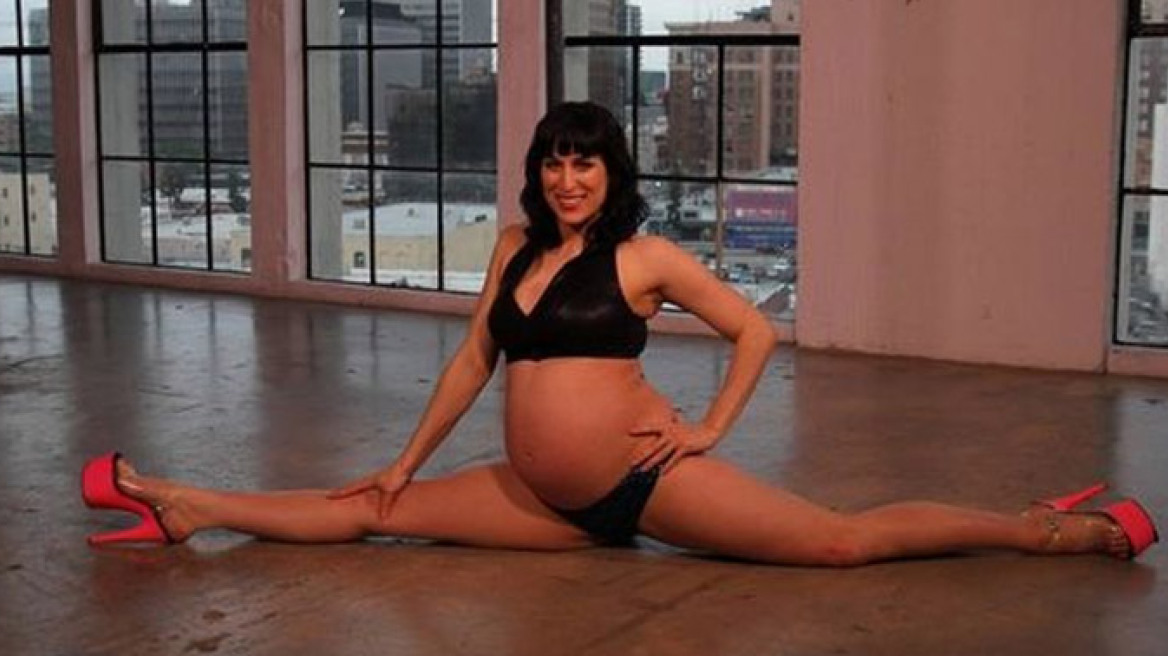 Pregnant poll dancer still doing the splits (pics+vid)