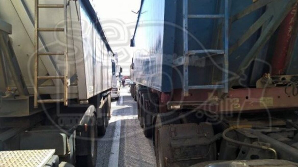 Refugees block a 2nd part of a Greek national highway in the north