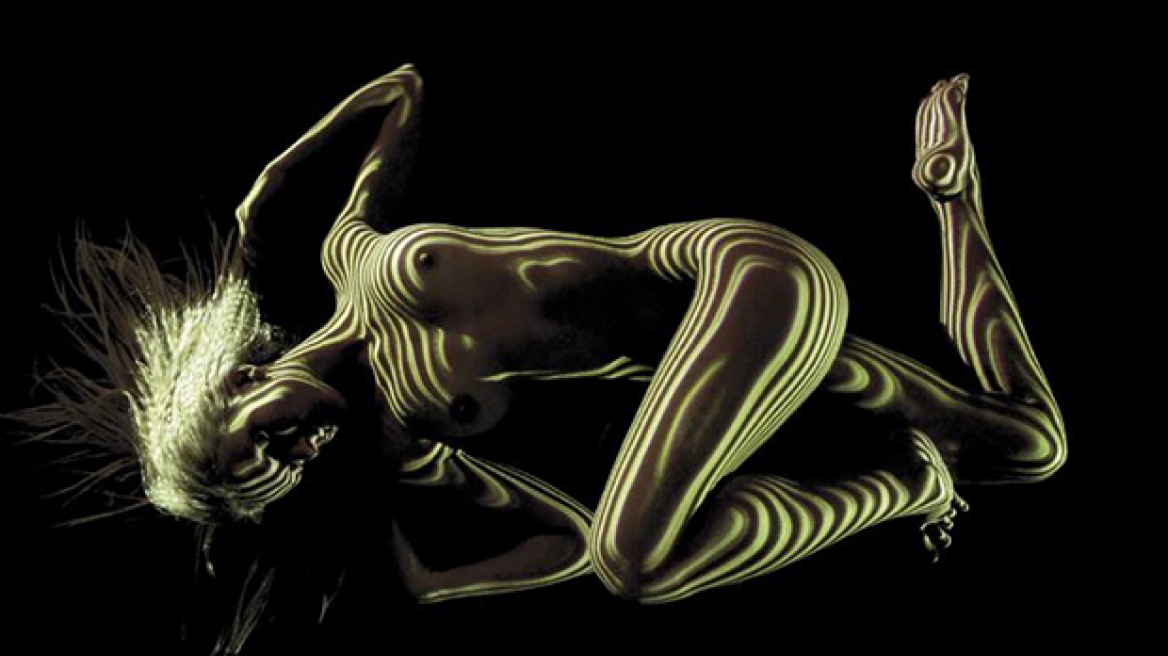 Stunning photos of female form dressed only in light