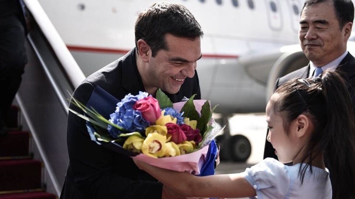 Greek delegation led by PM Tsipras lands in China (photos+video)