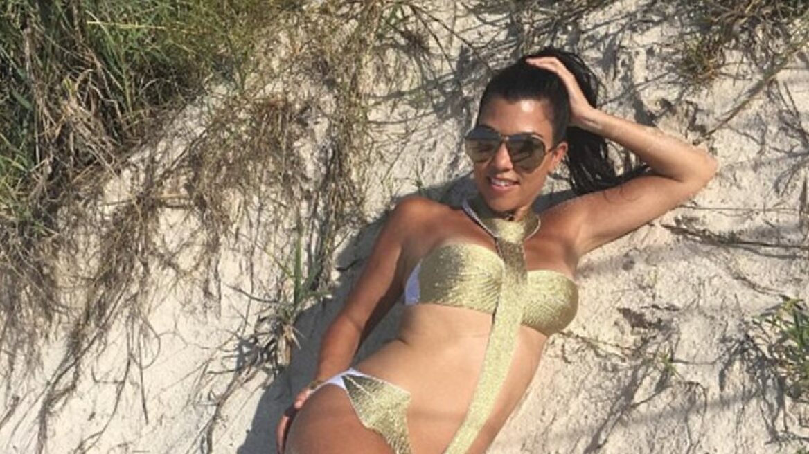 Kourtney Kardashian sexy pose in 1,400-dollar swimsuit (photo)