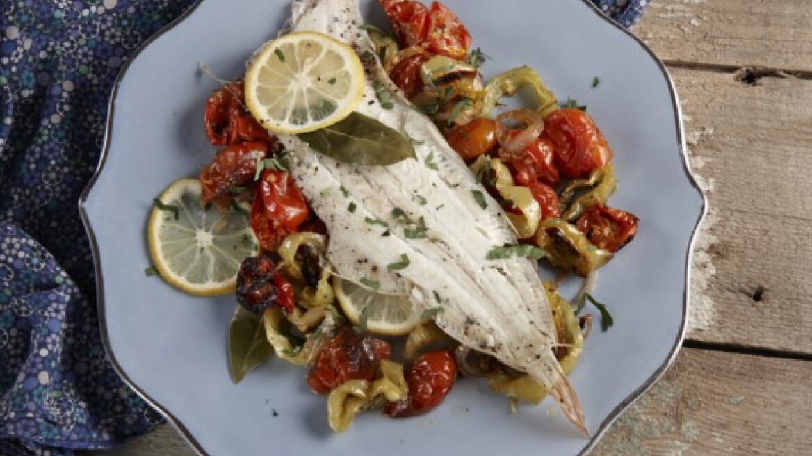 Sole fish fillets baked with cherry tomatoes