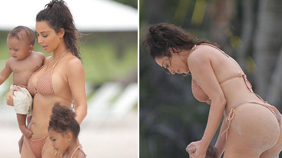 Kim Kardashian with kids on the beach (photos)