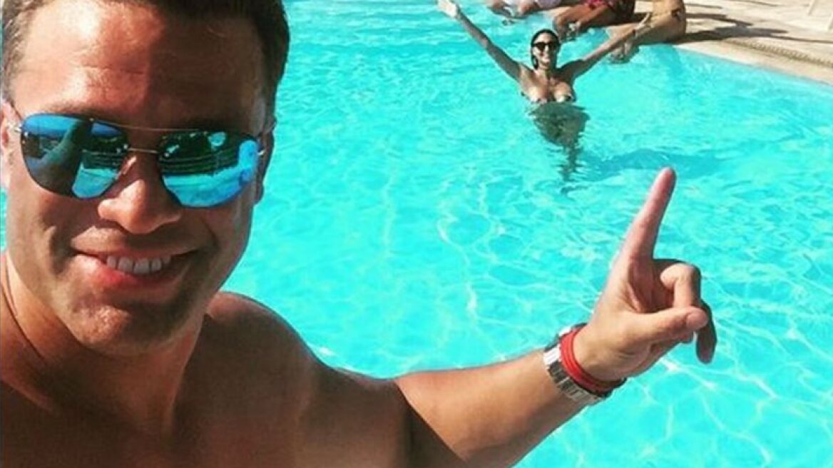 Greek actor Kostas Sommer and his girlfriend relax by the pool (video)