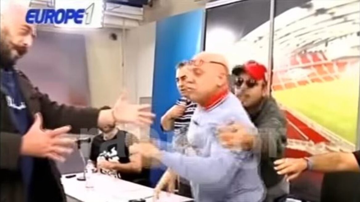 Fan attacks host on live TV (video)