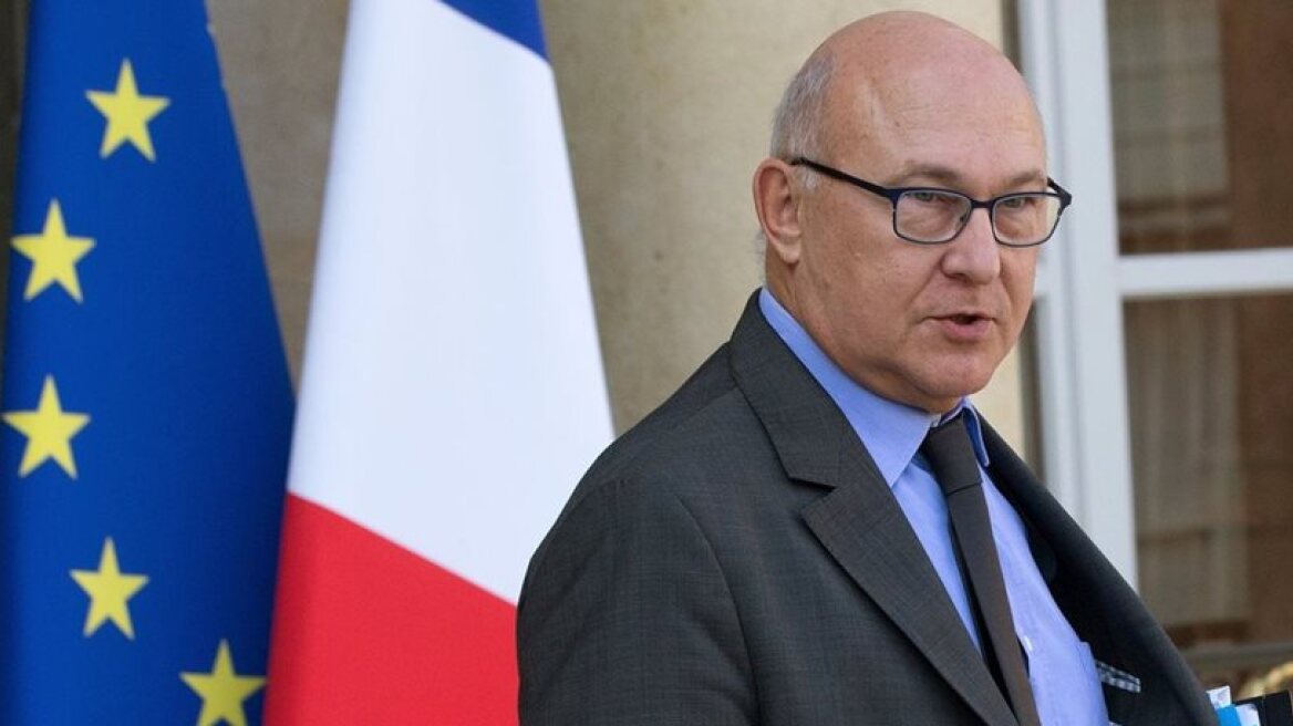 France objects to suspension of Greek debt relief measures by EuroGroup, says Sapin