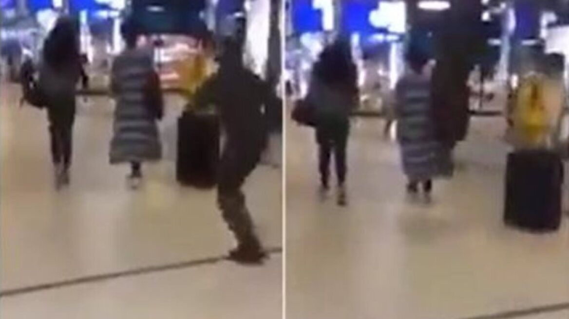 Shocking video of man kicking woman in back (video)