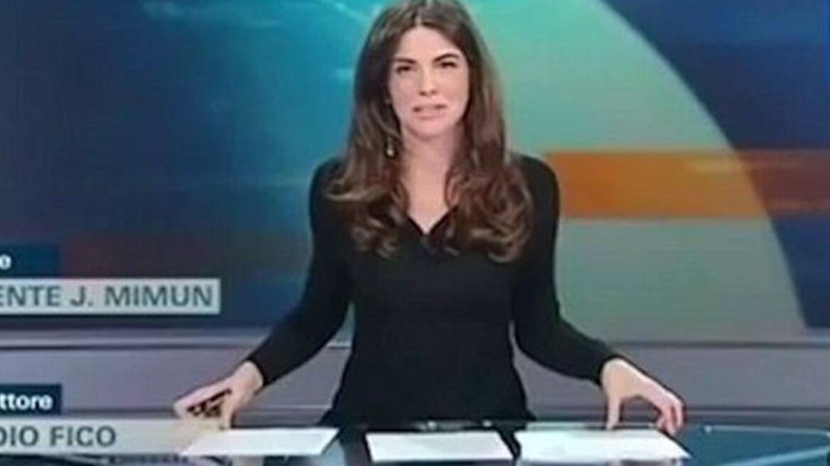 Real "Basic Instinct" moment for hot Italian news reader (video)