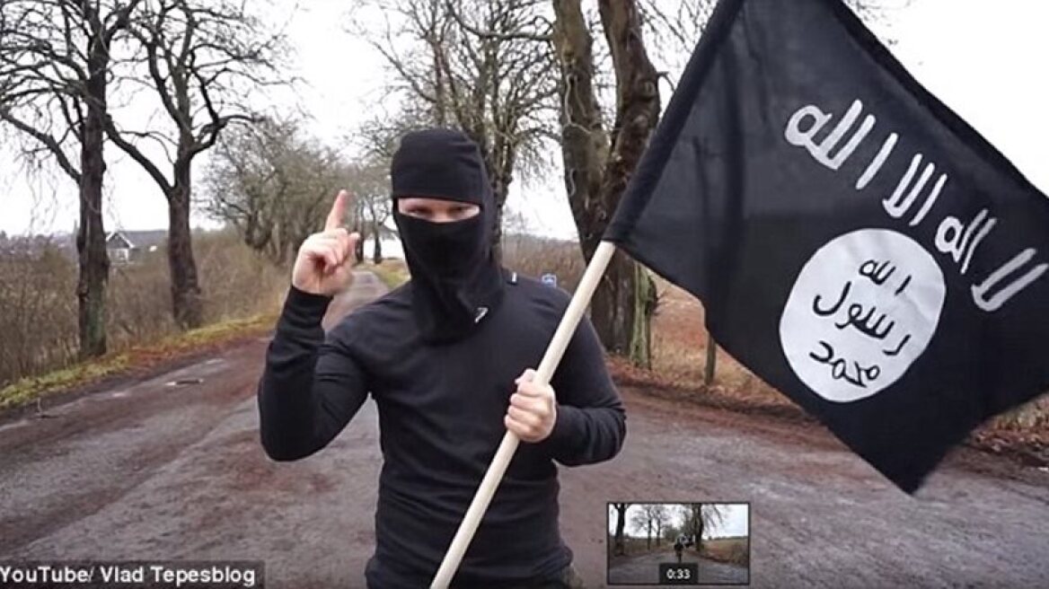  Masked man with ISIS flag in hand crosses German boarders! (VIDEO+PHOTOS)
