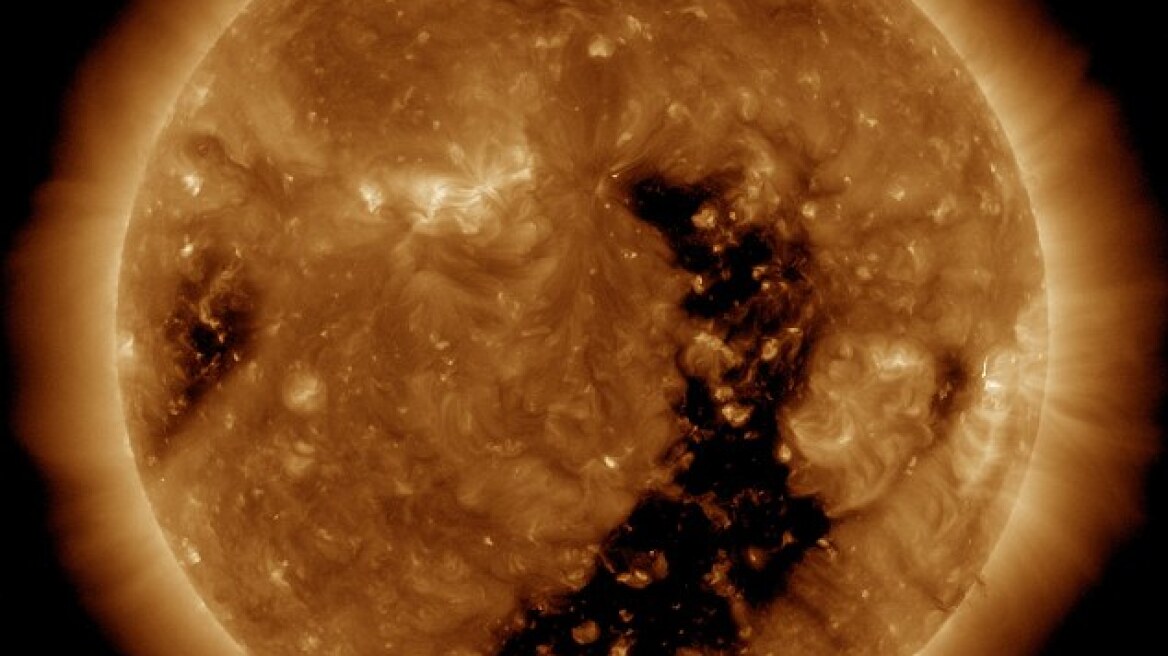 The sun is ripping apart! NASA image shows vast ‘hole’ spreading across the solar surface