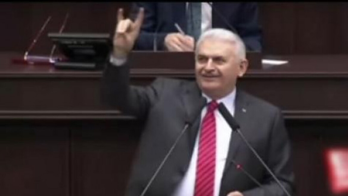 The Turkish Prime Minister hand-in-hand with the ultra-nationalists! (PHOTO)