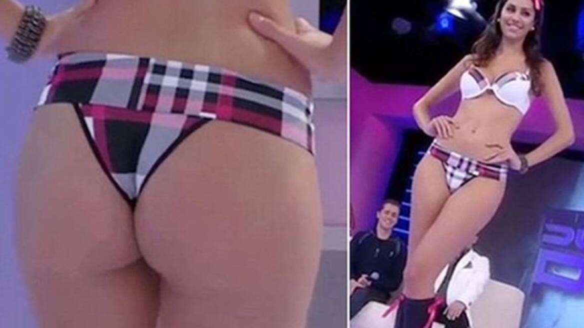 Cameraman zooms in on sexy girl’s buttocks (video)