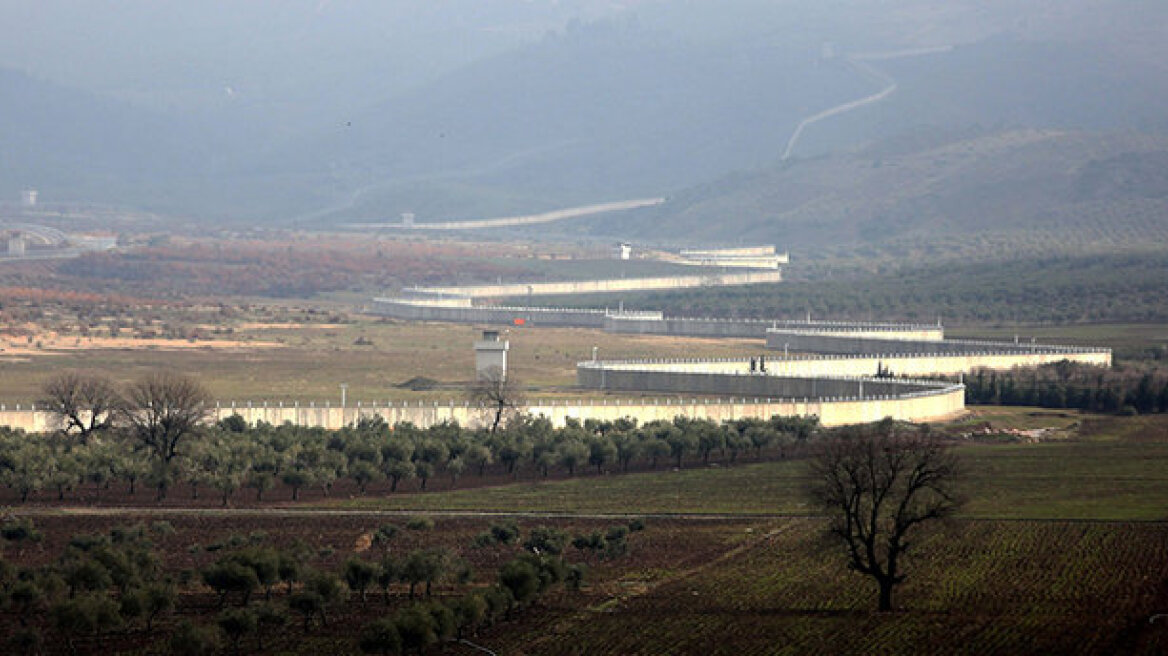  Turkey-Syria border wall completed by half