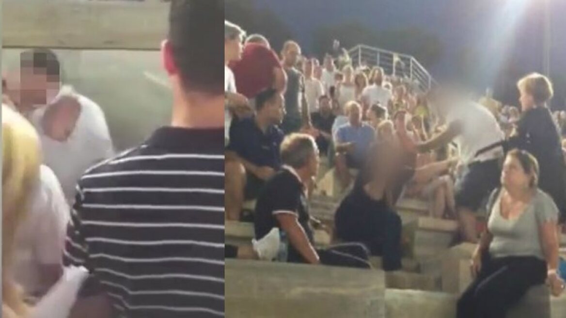 Husband assaults wife at open concert (videos)