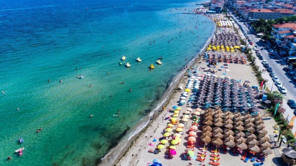 What do tourists do their first day on holidays?