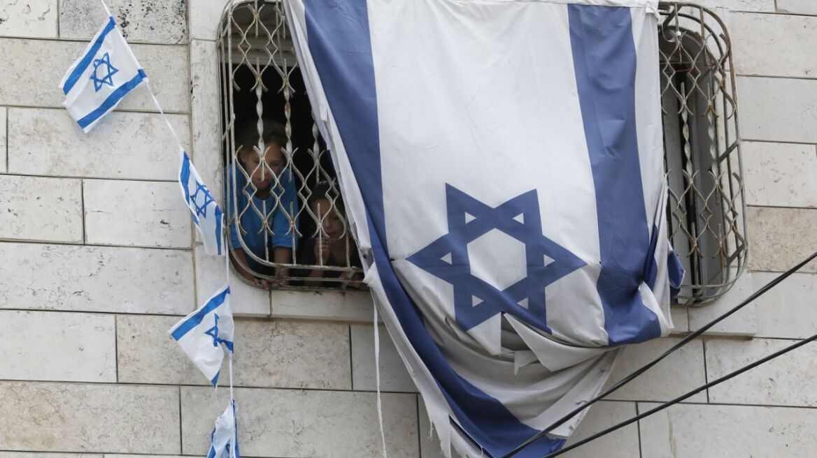 The Latest: Palestinians cheer after Israel removes devices