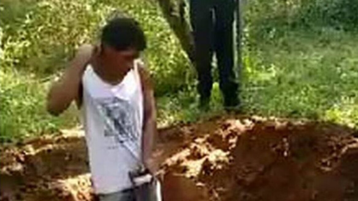 Horrific video of cousins digging their grave and getting shot (warning: distressing footage!)