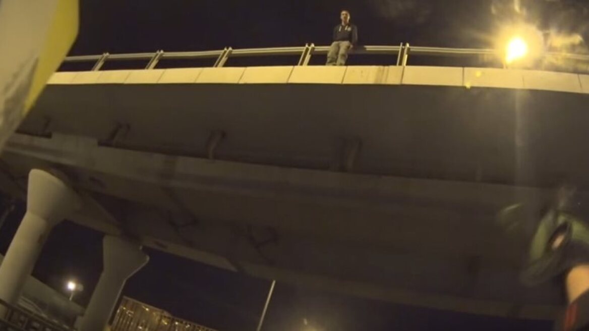 Biker prevents man from plunging to his death (video)