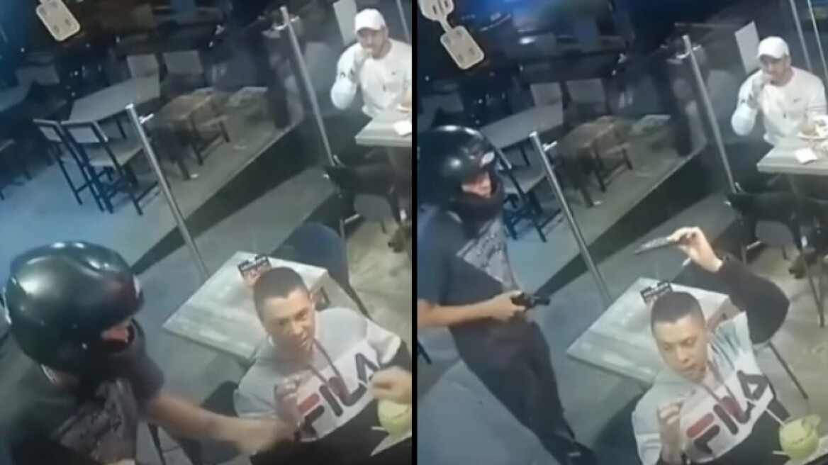 Χαλαρός τύπος συνεχίζει να τρώει φτερούγες ενώ τον κλέβει ένας νεαρός με όπλο (vid)