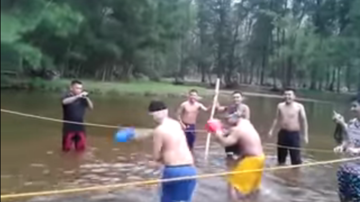 Blind-folded boxing in a water ring! (funny vid)