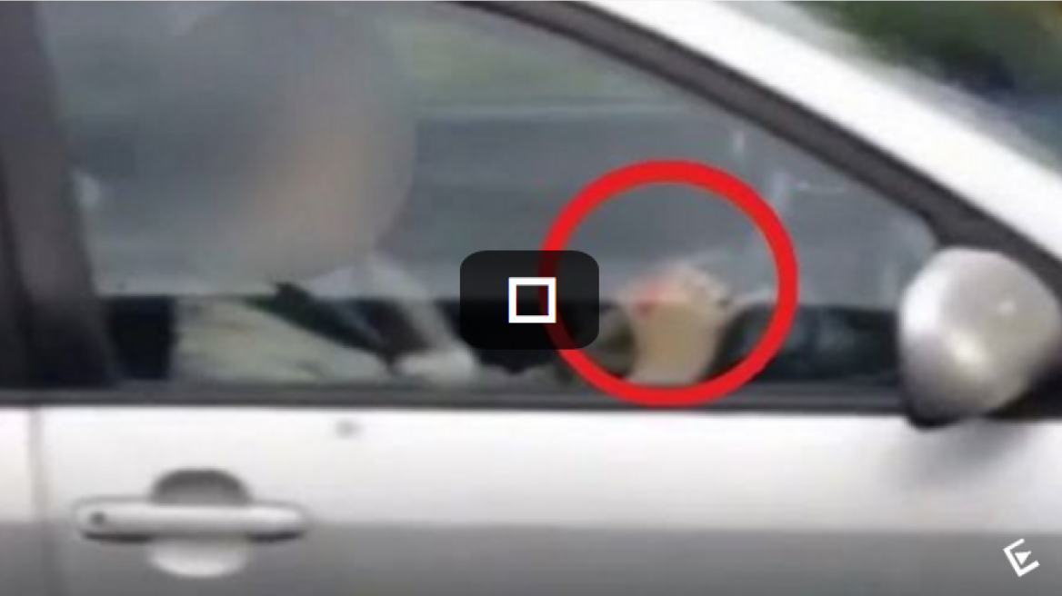 Woman tries to solve Rubik’s cube while driving (video)
