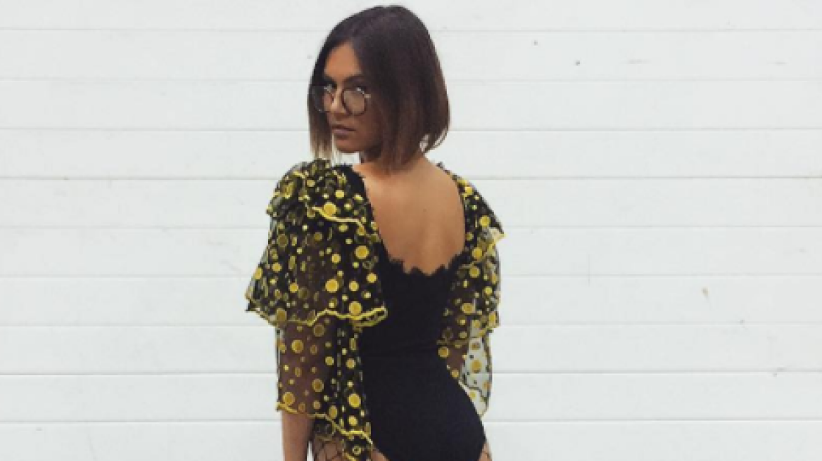 Hot Elena Tsangrinou shows off “rear” in fishnet bodysuit (photo)