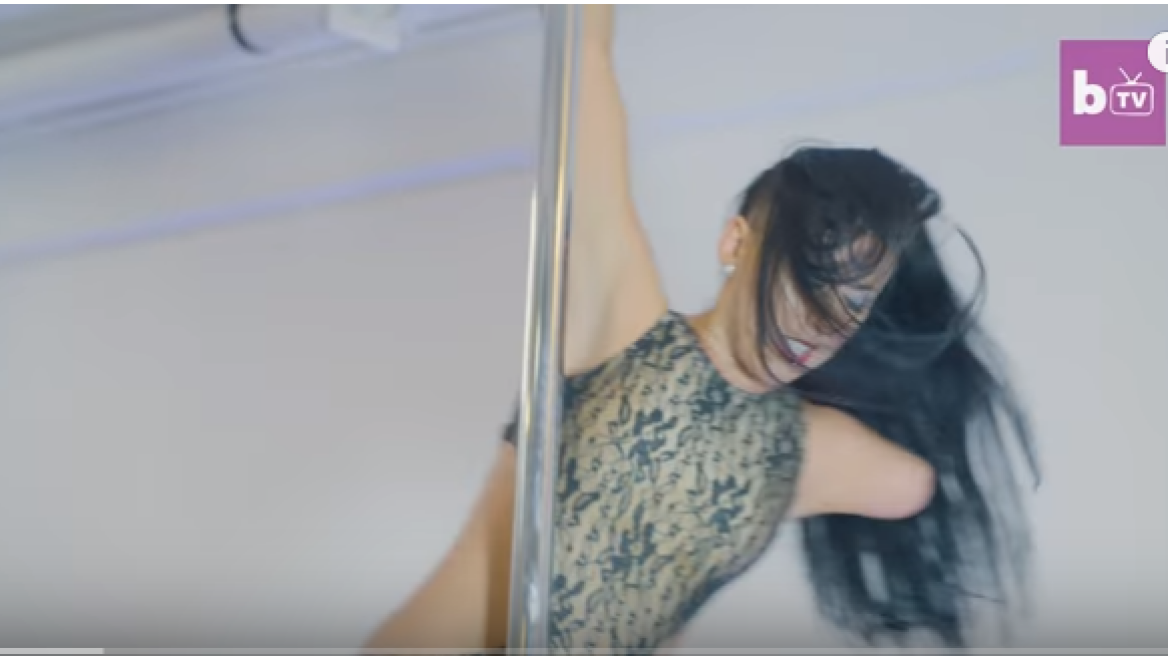 Pole dancing champ with one arm! (video)
