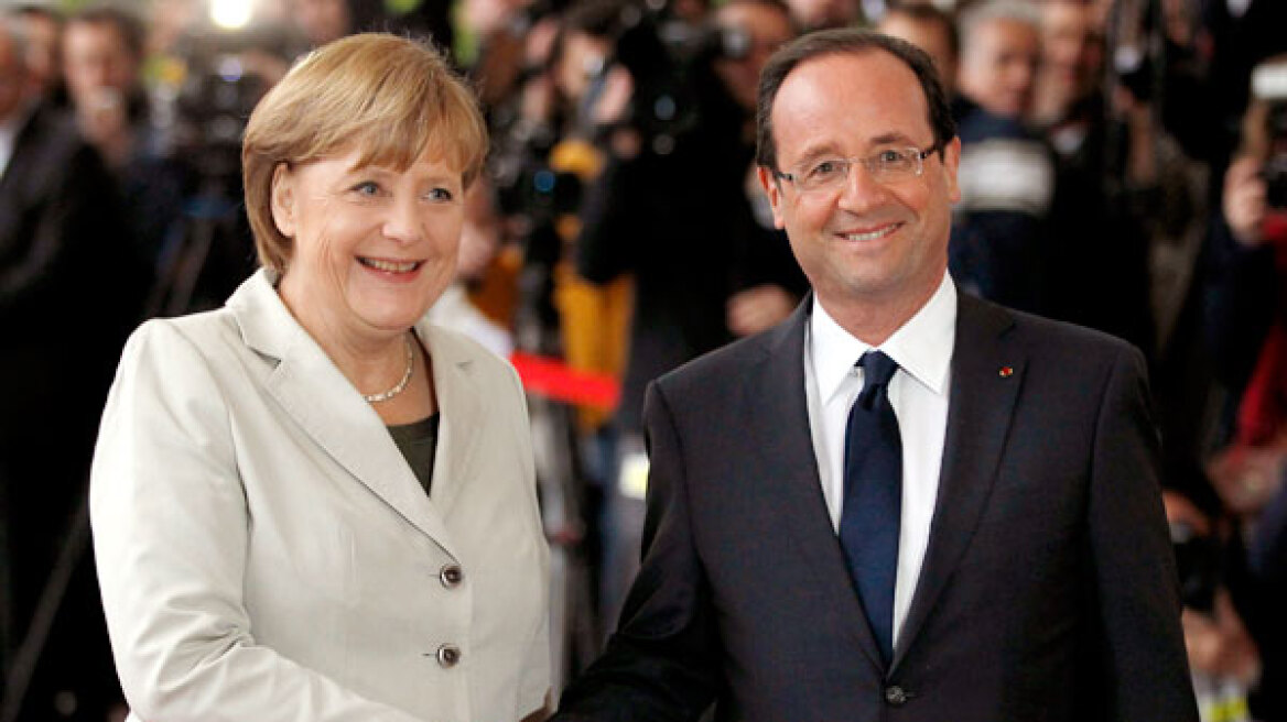 Μέρκελ - Ολάντ: Αποφασισμένοι να προστατεύσουν την Ευρωζώνη
