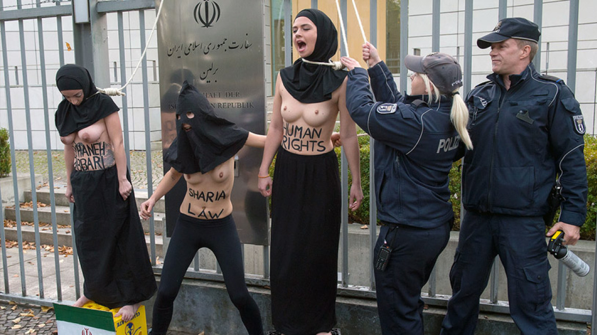 Femen: «Κρυφτοκυνηγητό» με την αστυνομία στους δρόμους του Παρισιού!