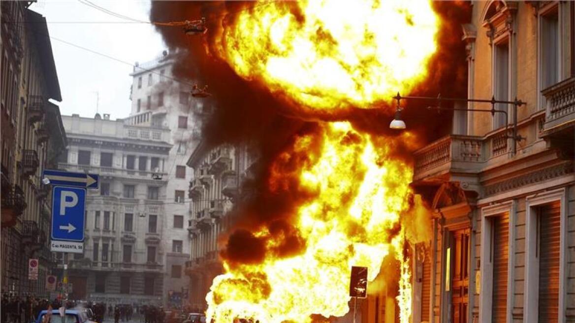 Το Μιλάνο στις φλόγες: Διαδηλωτές έκαψαν τράπεζες, καταστήματα και αυτοκίνητα