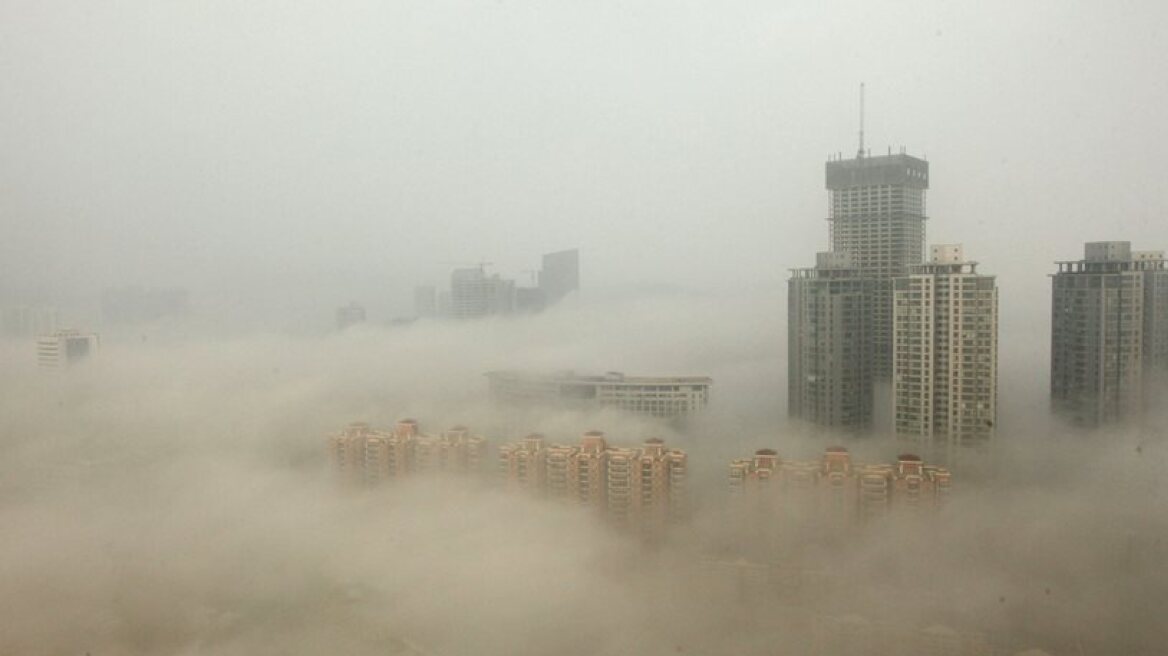 Beijing issues red alert for heavy air pollution