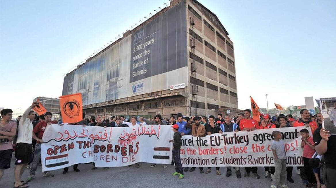 Refugees participate in protest rally at Omonia square