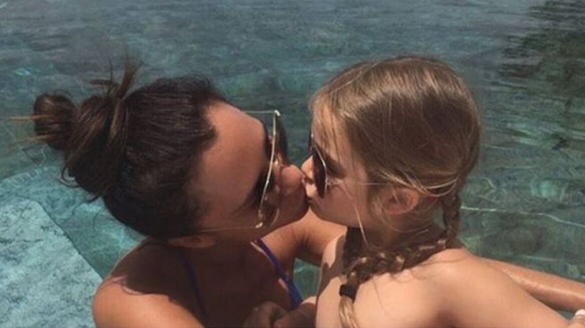 Victoria Beckham’s kiss on daughter’s lips causes uproar (photo)