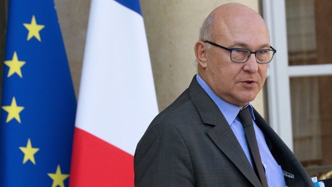 France objects to suspension of Greek debt relief measures by EuroGroup, says Sapin
