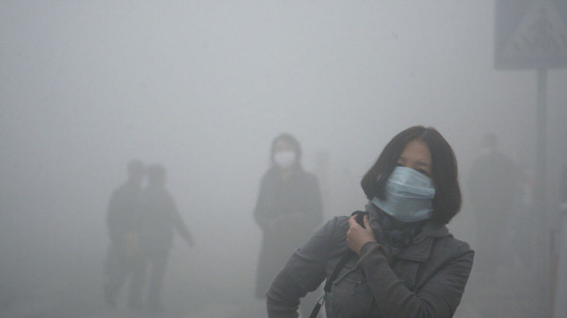 Σε «πορτοκαλί» συναγερμό κινεζική πόλη λόγω ατμοσφαιρικής ρύπανσης