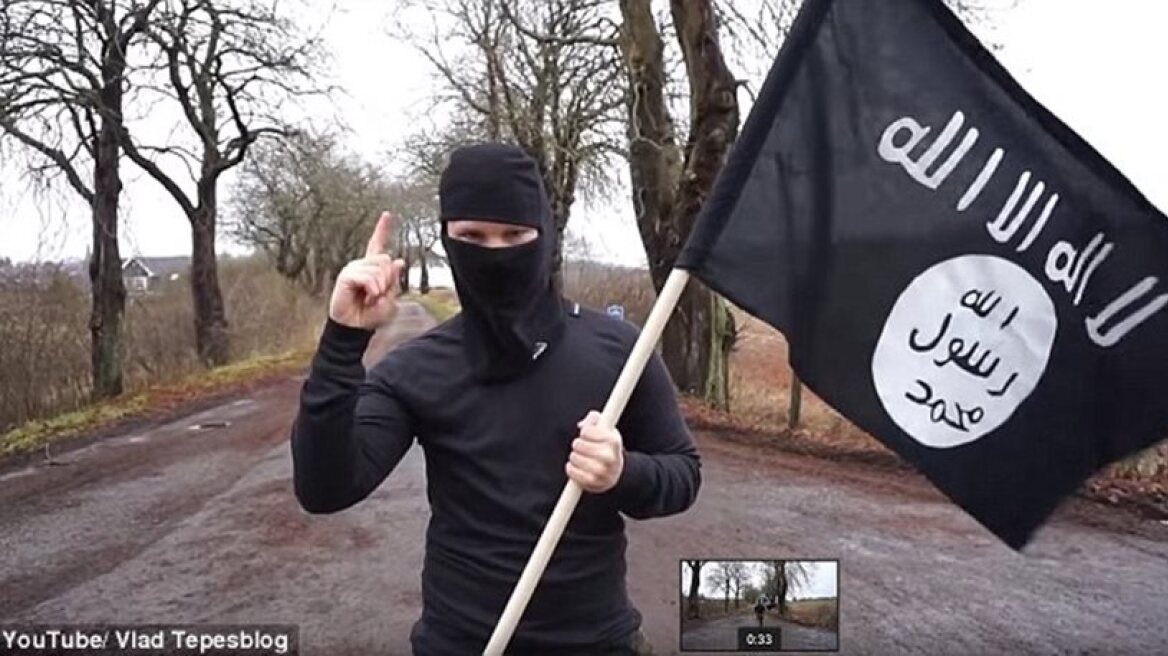  Masked man with ISIS flag in hand crosses German boarders! (VIDEO+PHOTOS)