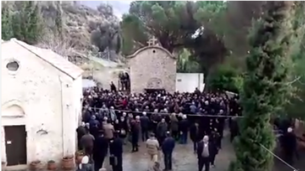 Viral video of priest’s funeral in Crete with gunshots (video)