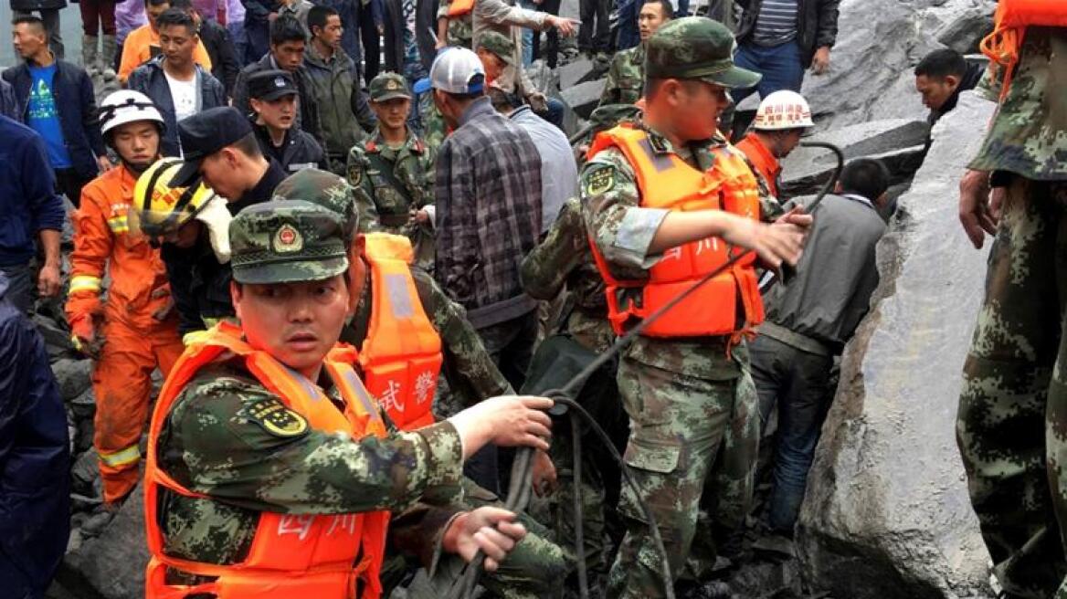  Over 140 people feared buried in China landslide