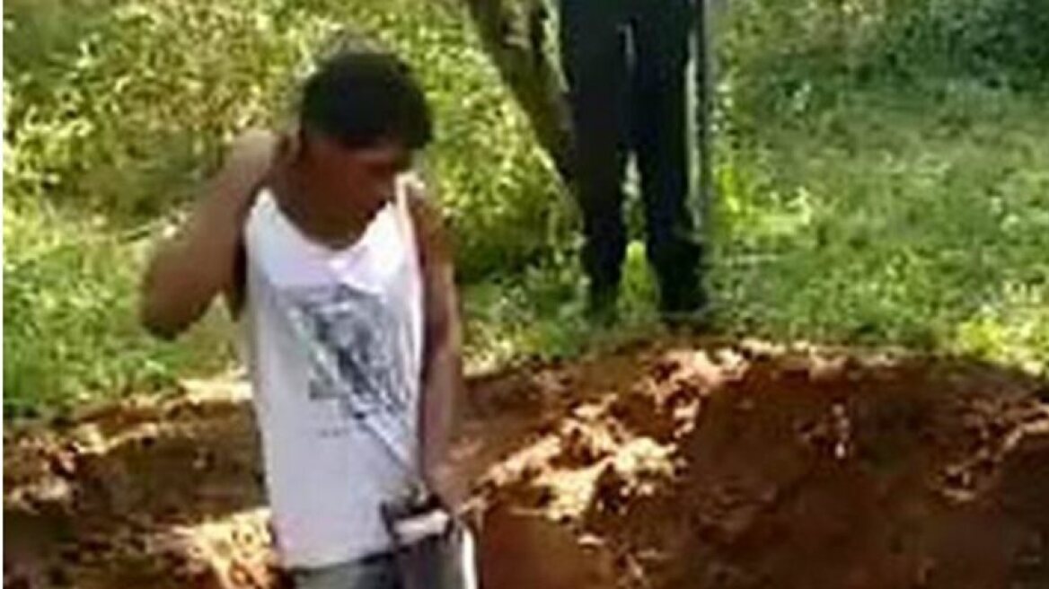 Horrific video of cousins digging their grave and getting shot (warning: distressing footage!)